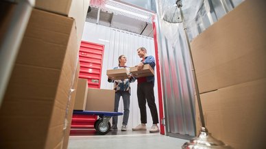 Man and woman outside storage unit